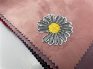 Strygemærke - grå blomst